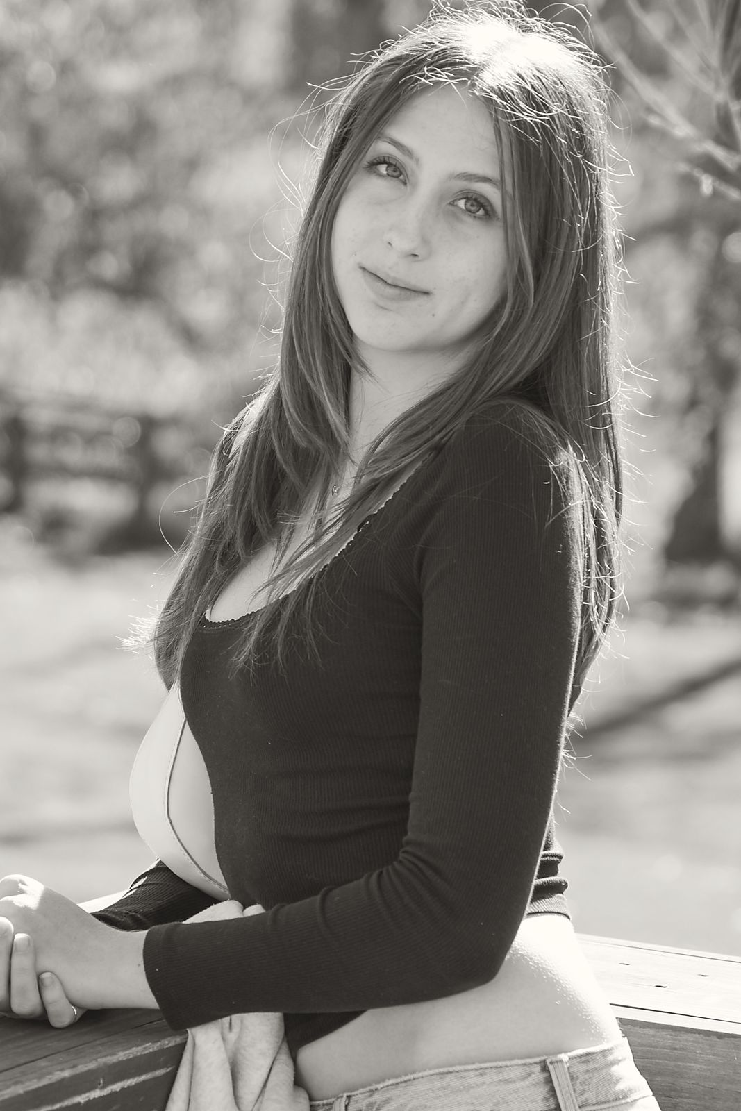 Three-quarter portrait in a garden, looking at the camera