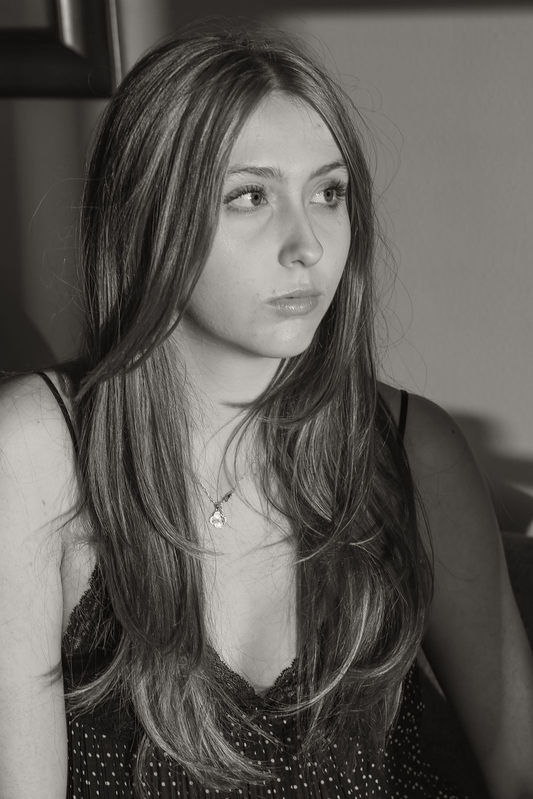 Window-light portrait looking off camera