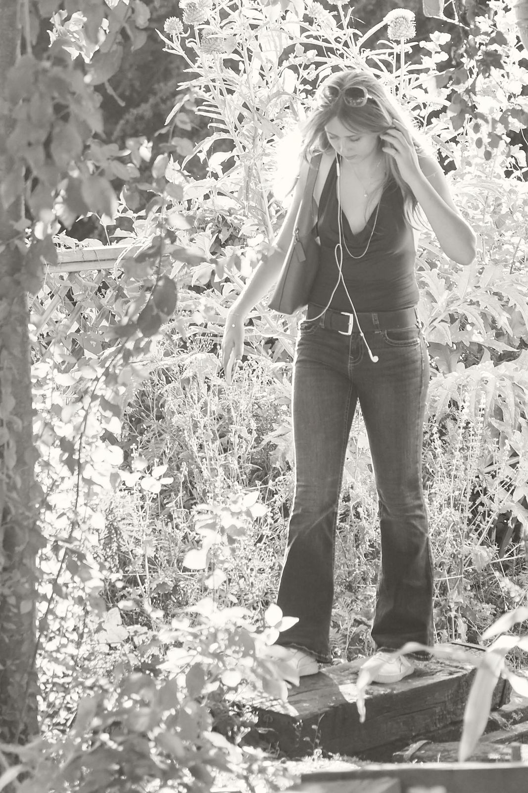 Full-length in a sunlit garden