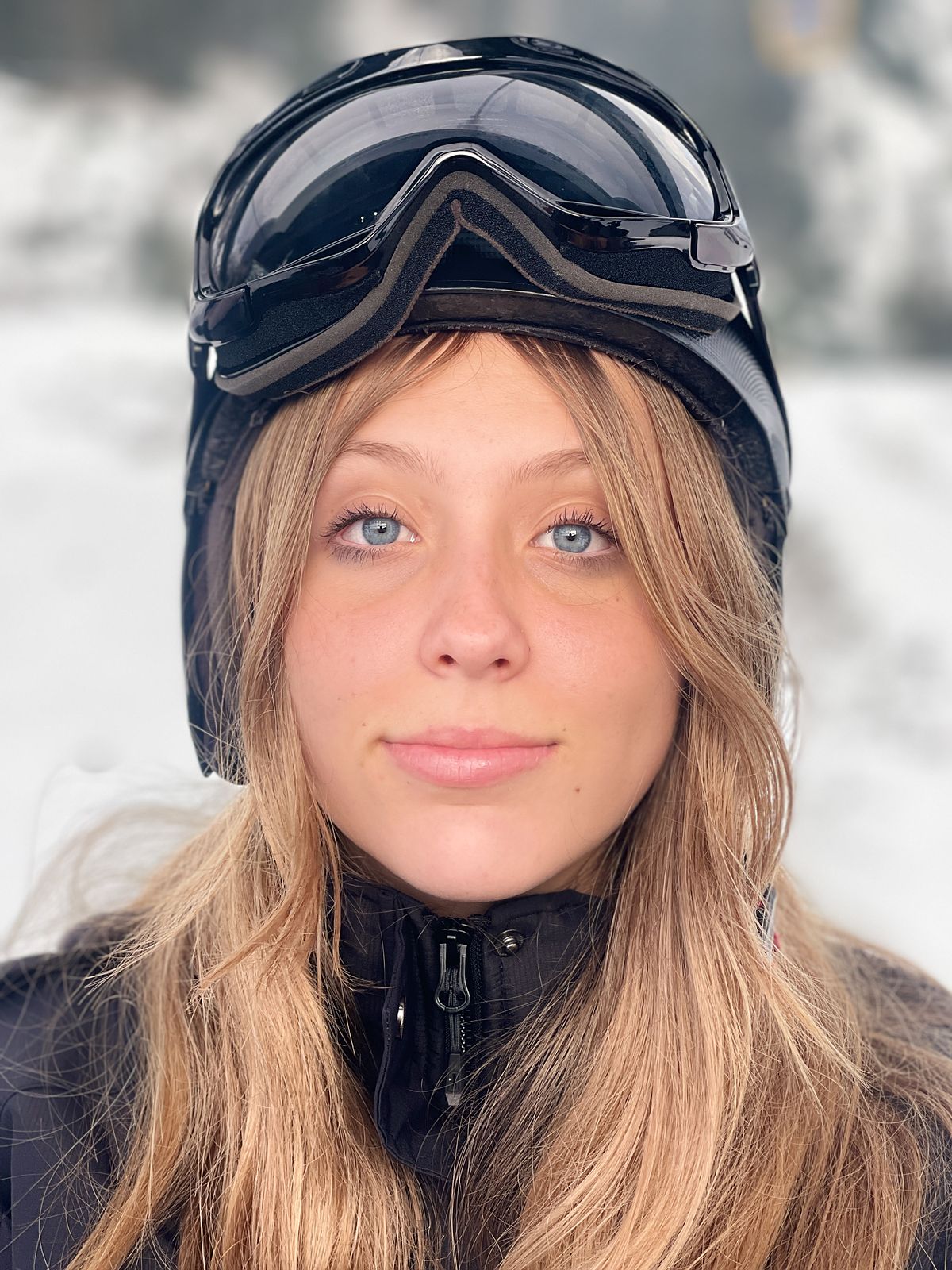 Colour headshot, facing the camera, natural expression
